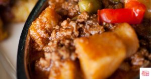 Sweet potato, ground beef, and peppers cooked in a skillet. This articles shares a recipe for anti-inflammatory breakfast hash.