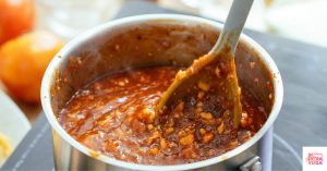 Chili being mixed in a pot on the stove. This recipe is for an anti-inflammatory chili.