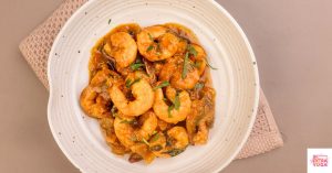 Shrimp creole on a plate. This articles shares a paleo shrimp creole recipe.