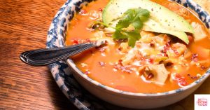 Paleo chicken tortilla soup in a bowl.